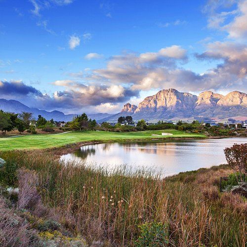 Winelands golf course with lake and mountain backdrop